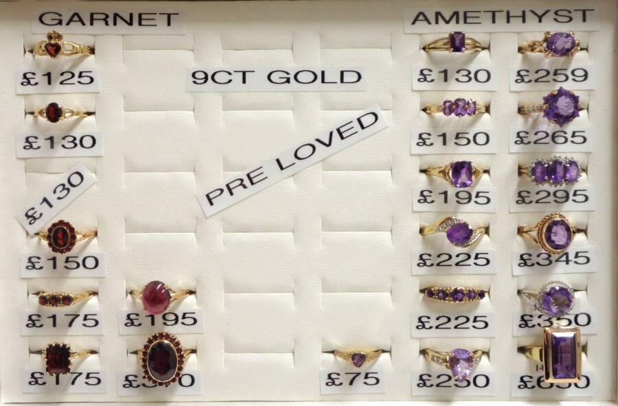 A Selection of PRE-LOVED Garnet and Amethyst Rings in 9ct and 14ct Gold